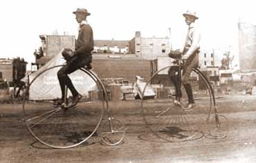 Victorians Riding Penny Farthings